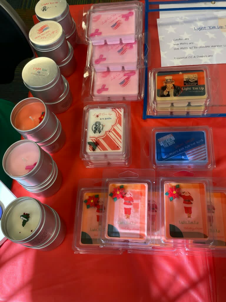 Light Em Up candles and wax melts at a community market